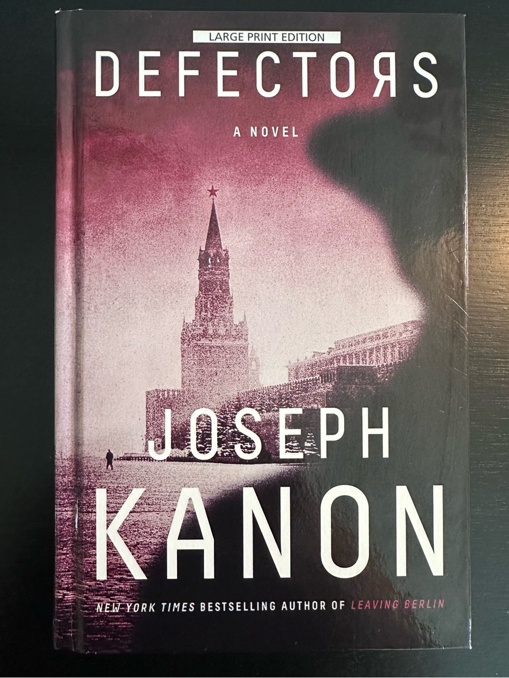 Defectors by Joseph Kanon- Large Print Edition - Pink/Black Hardcover Book